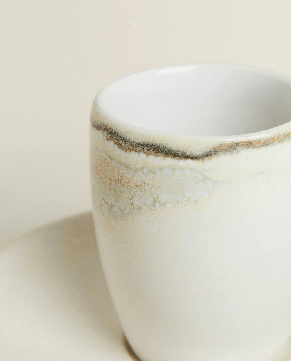 STONEWARE COFFEE CUP AND SAUCER