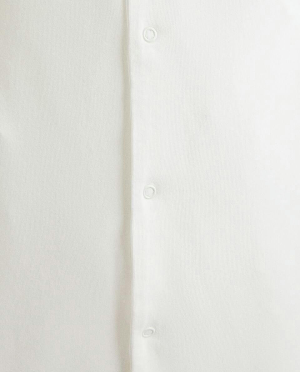 ROMPER WITH CONTRAST PIPING