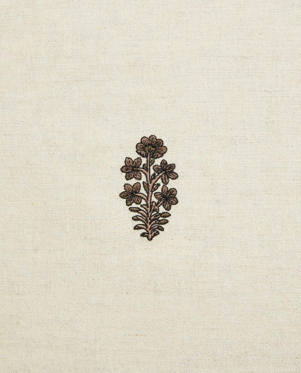 EMBROIDERED CUSHION COVER