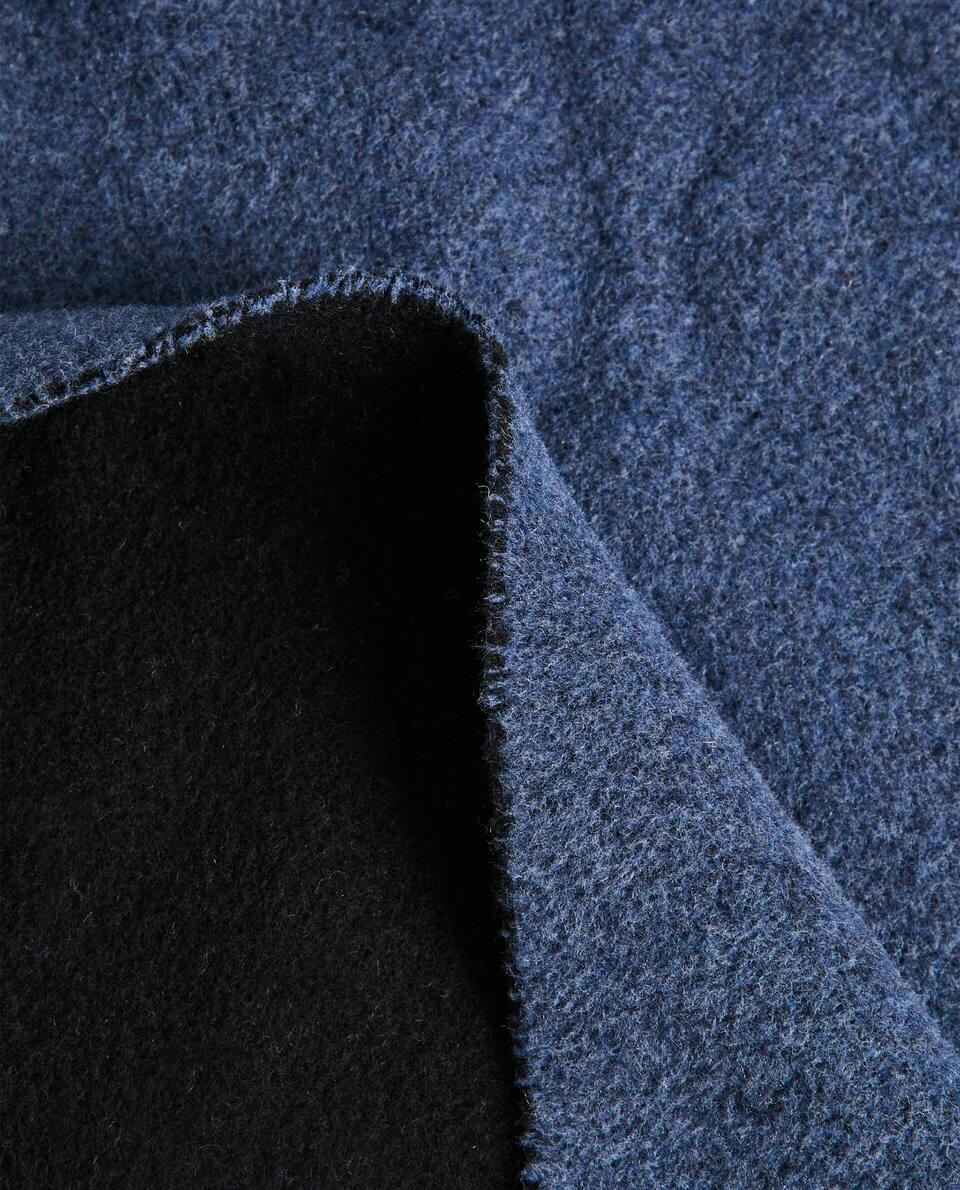 PLAIN-COLOURED BLANKET WITH FRINGE