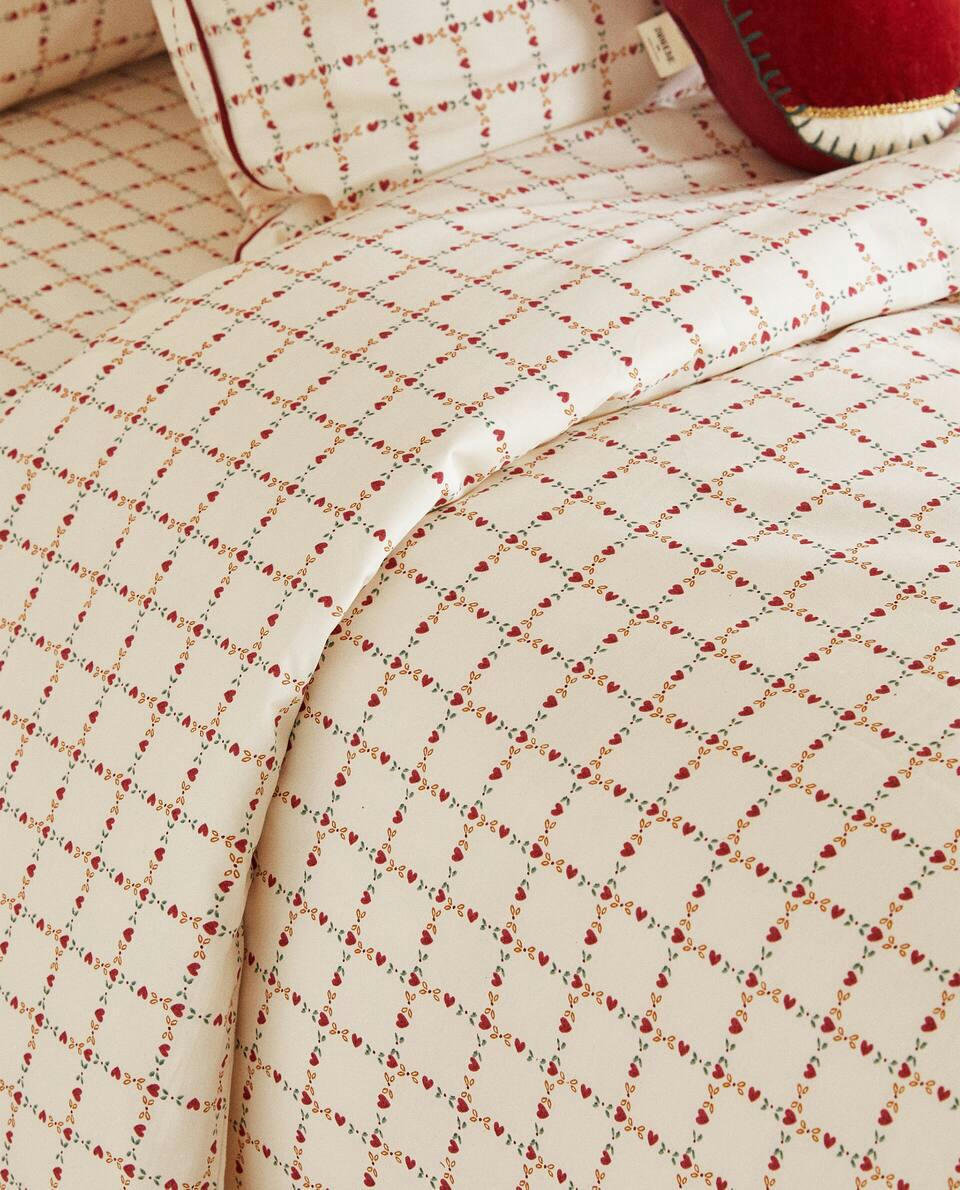 CHILDREN'S PERCALE FITTED SHEET WITH CHRISTMAS HEARTS