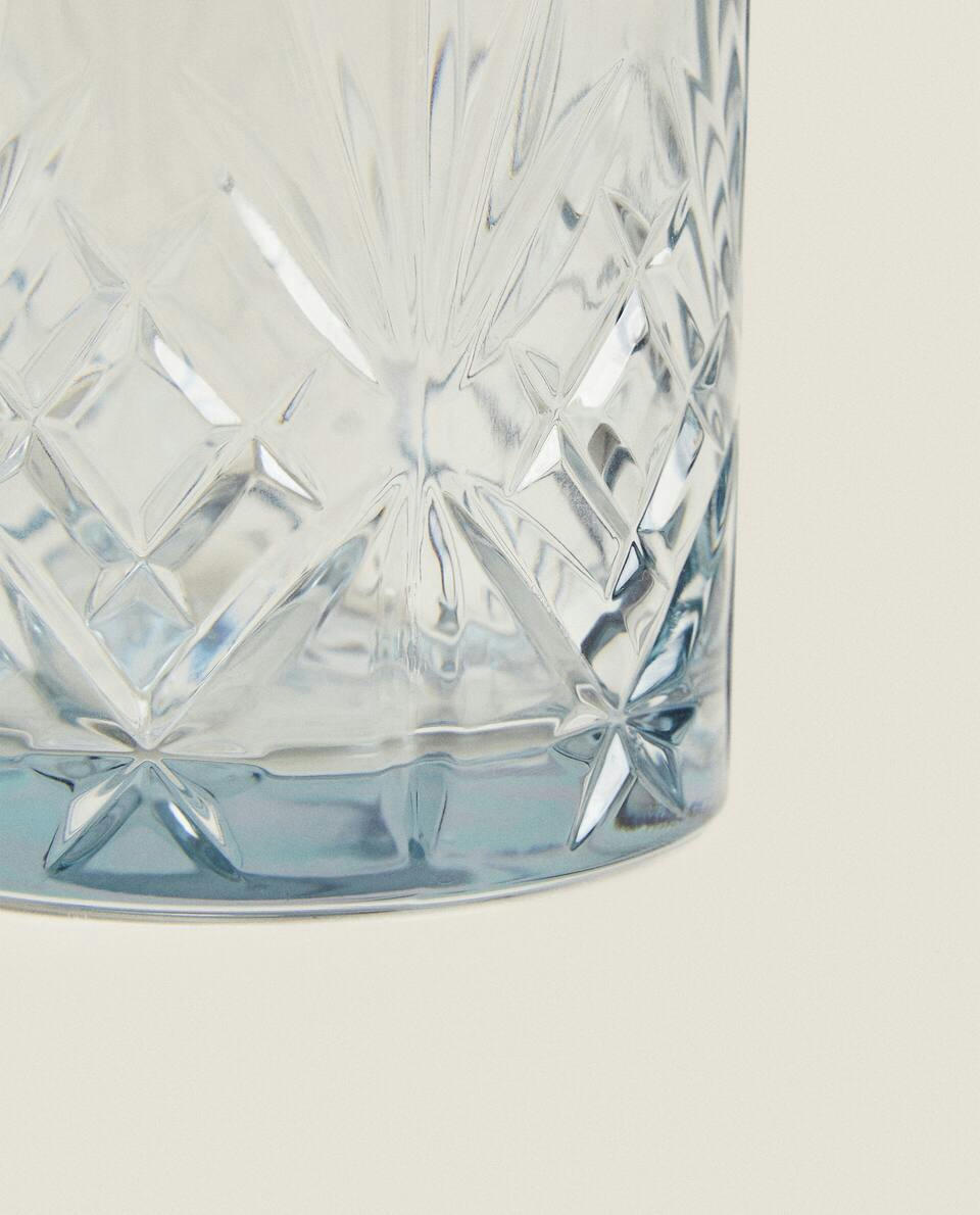 CRYSTALLINE TUMBLER WITH RAISED DESIGN