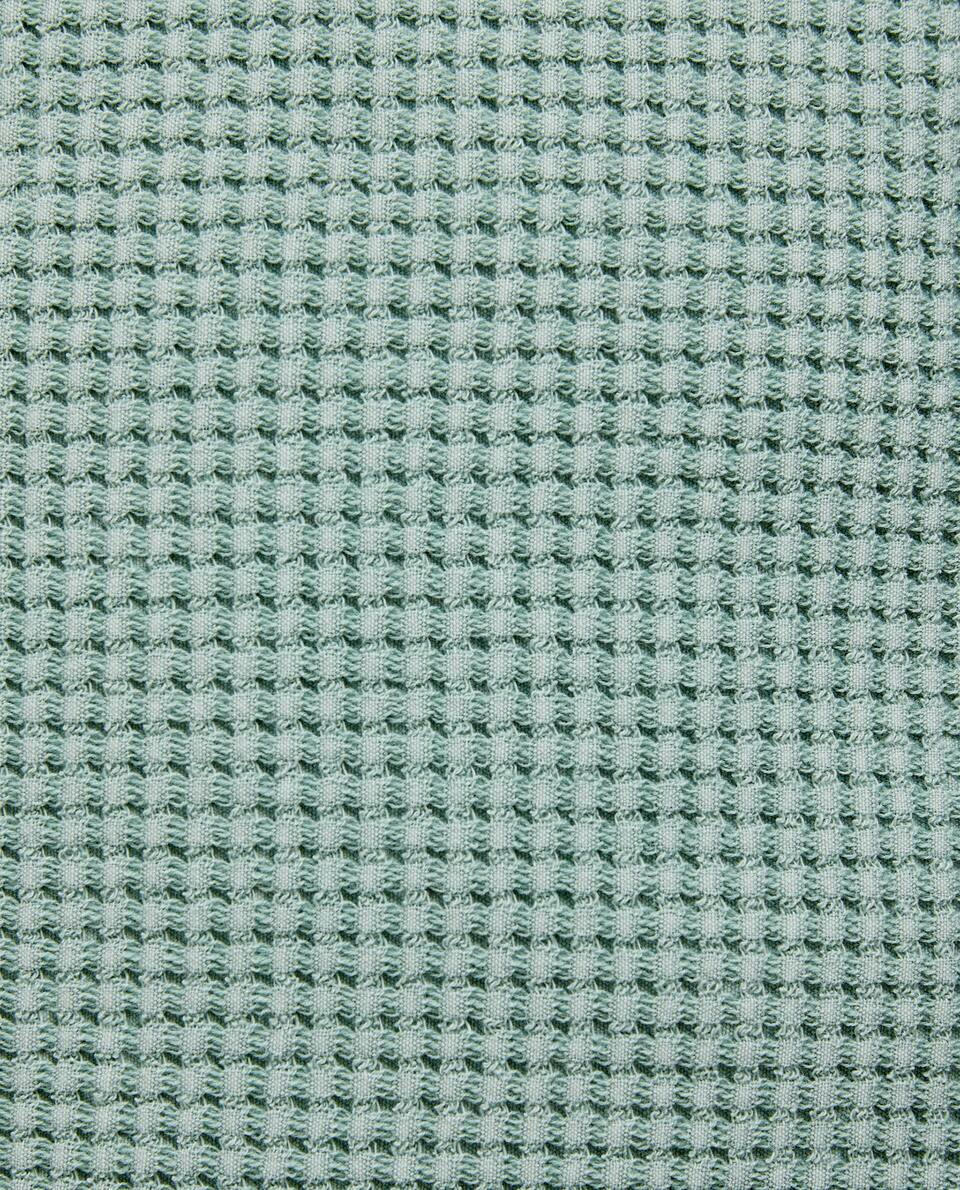 TEXTURED WAFFLE-KNIT CUSHION COVER