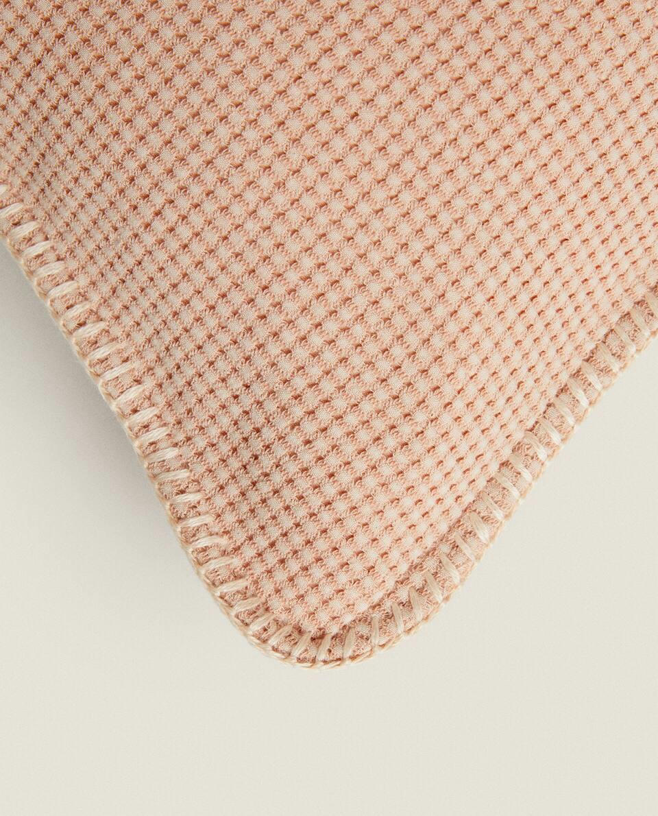 TEXTURED WAFFLE-KNIT CUSHION COVER
