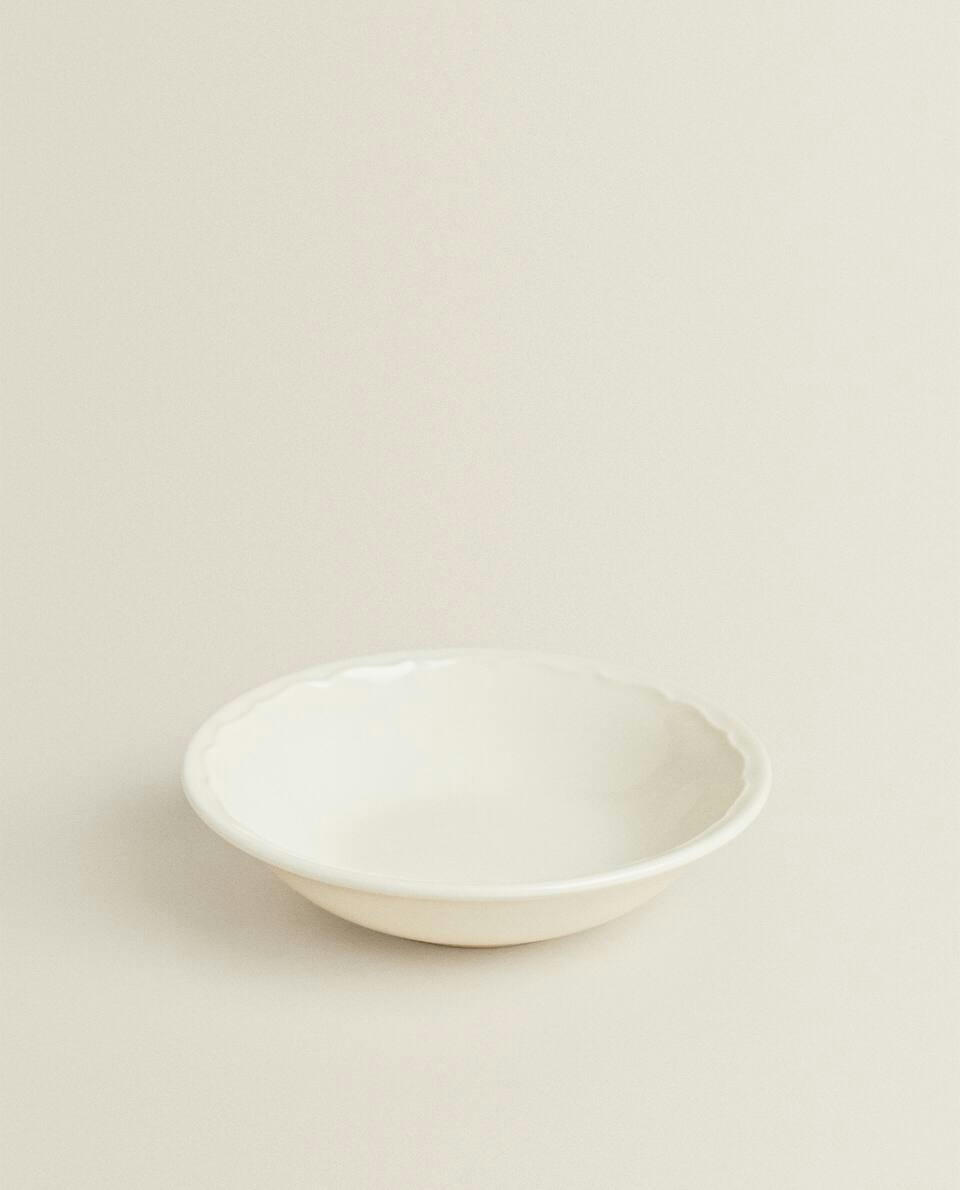 EARTHENWARE BOWL WITH RAISED-DESIGN EDGE