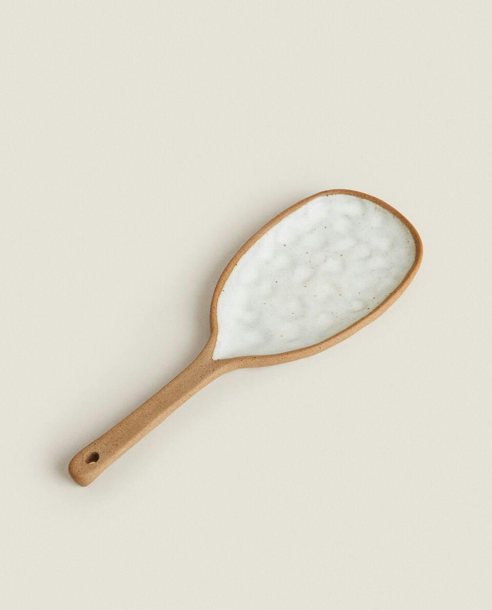 SPOON WITH RAISED DESIGN