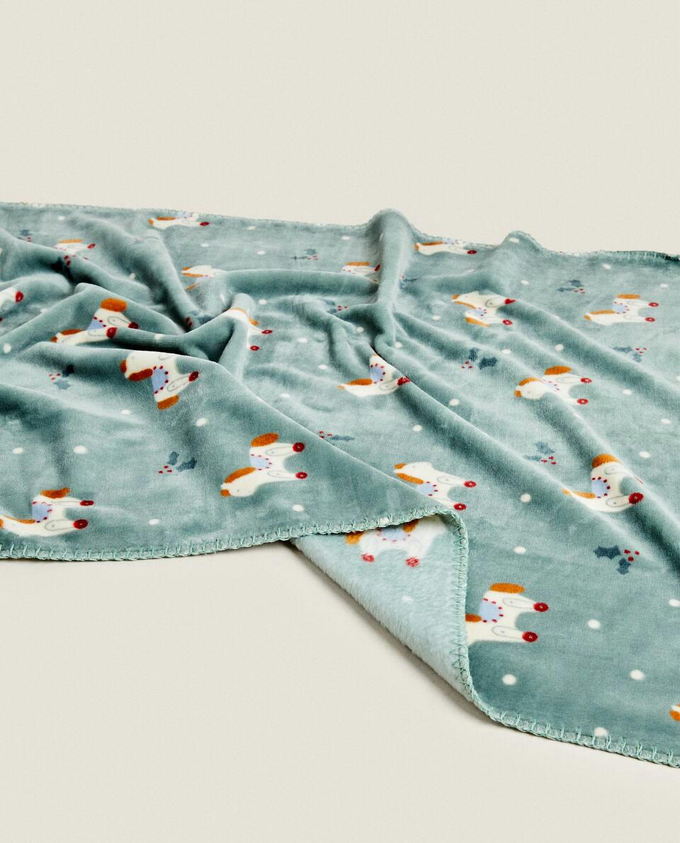 CHILDREN’S FLEECE BLANKET WITH CHRISTMAS ROCKING HORSE