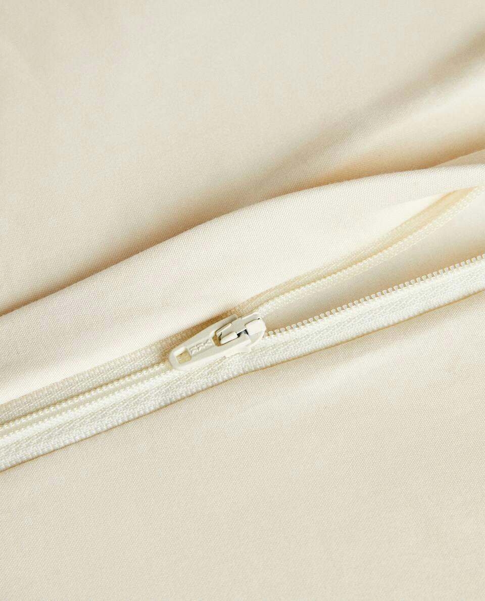 QUILTED DOTTED CUSHION COVER