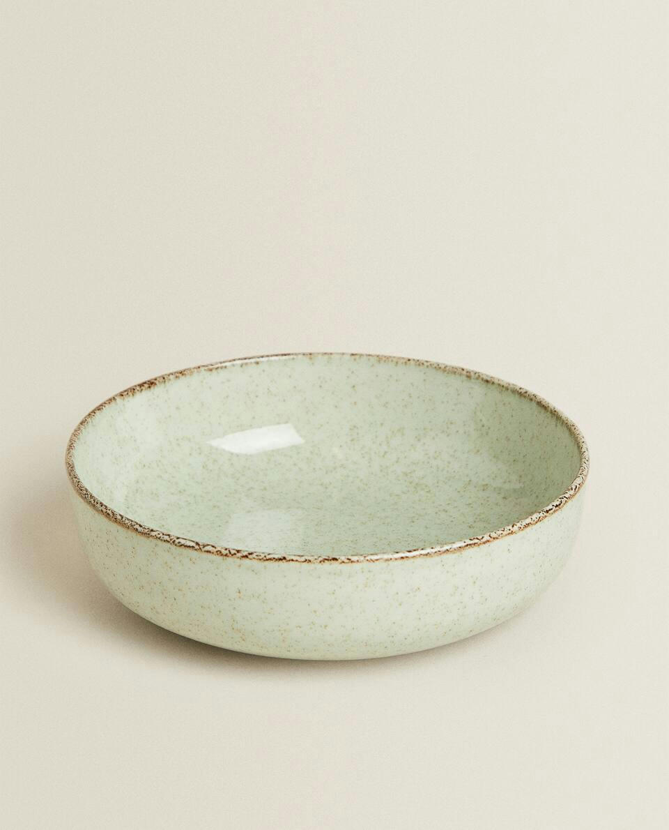 PORCELAIN BOWL WITH ANTIQUE FINISH RIM