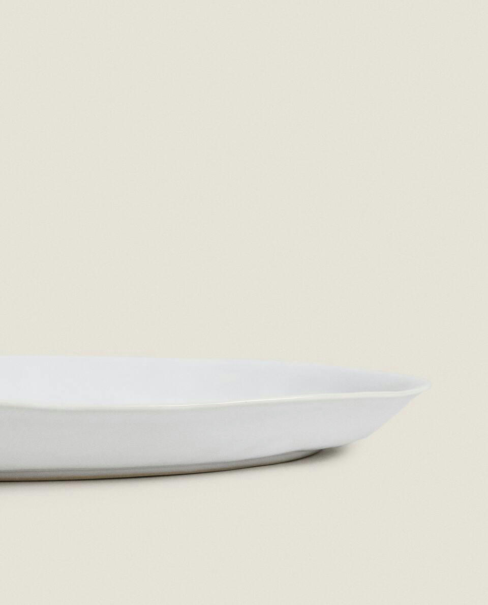 SET OF STONEWARE SERVING DISHES