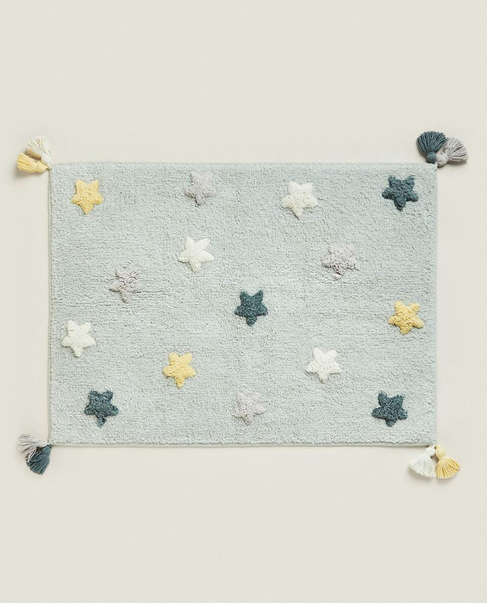 CHILDREN'S BATH MAT WITH POM-POM STARS