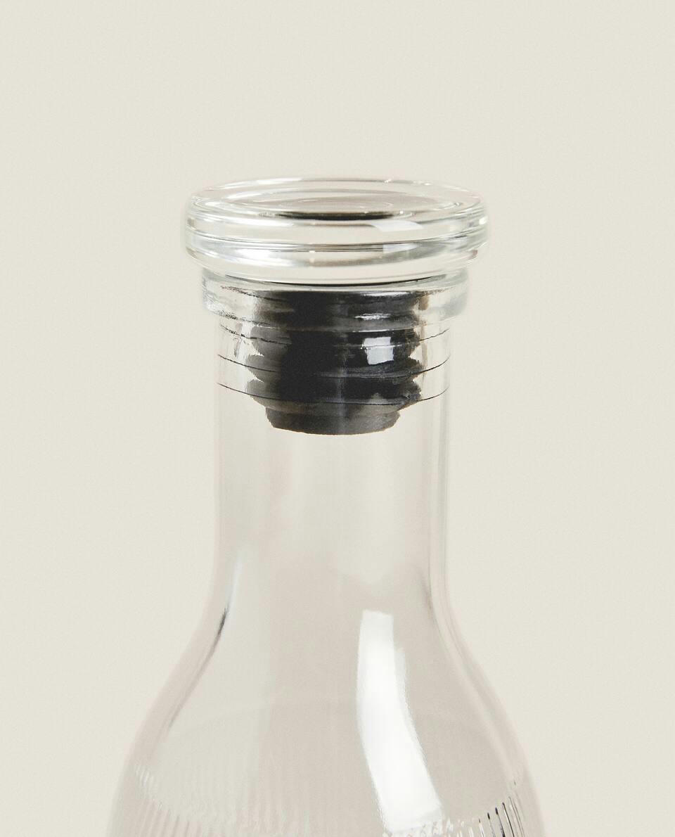 FACETED GLASS BOTTLE