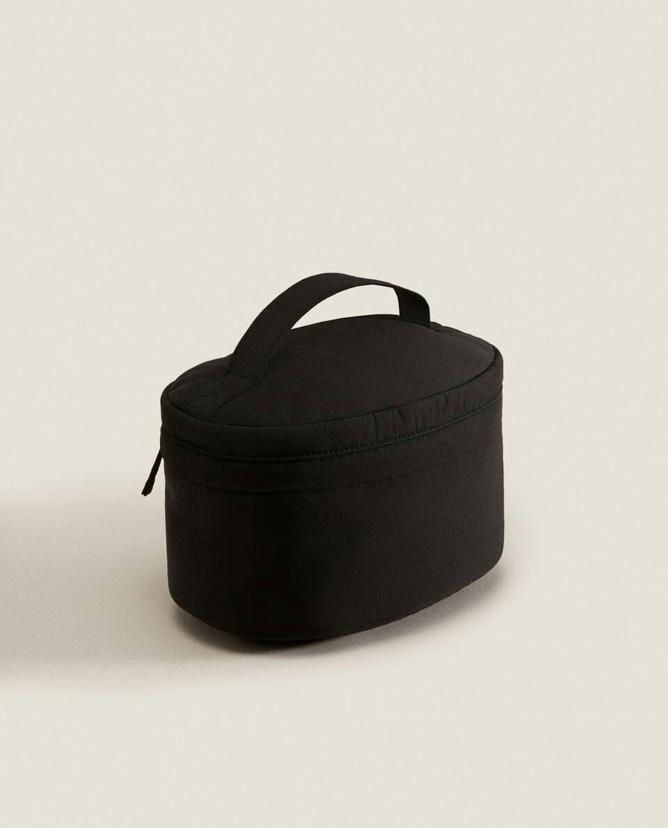 OVAL TECHNICAL FABRIC TOILETRY BAG