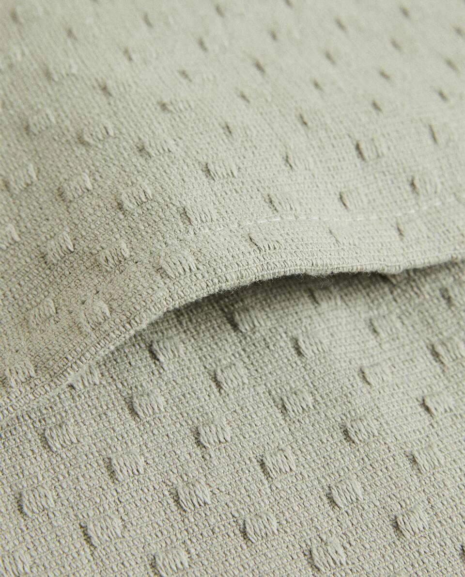 CUSHION COVER WITH POLKA DOT DESIGN