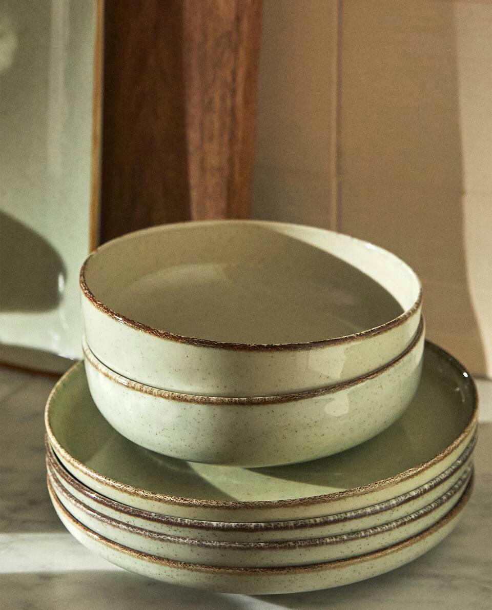PORCELAIN BOWL WITH ANTIQUE FINISH RIM