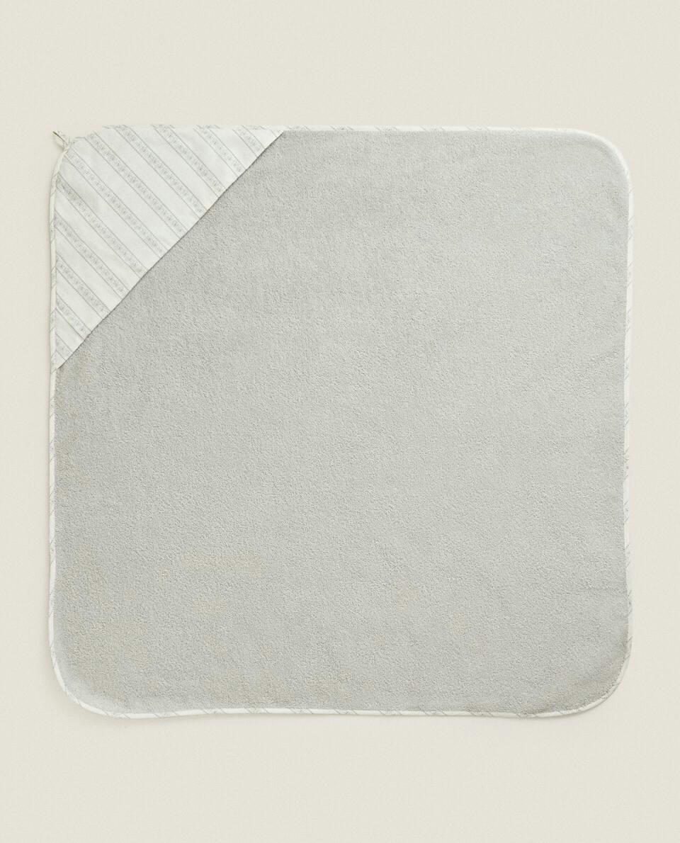 BABY CAPE WITH FLORAL BORDER