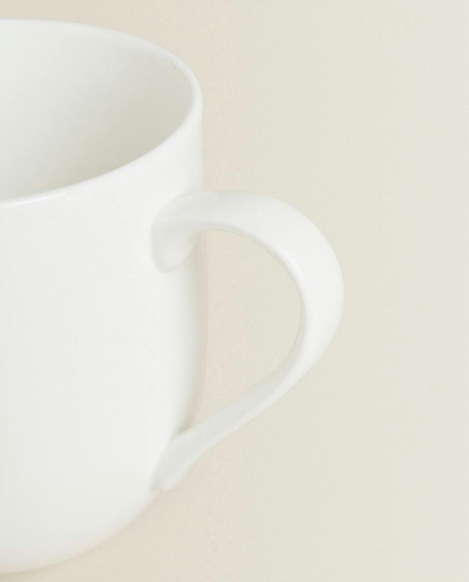 WHITE PORCELAIN MUG