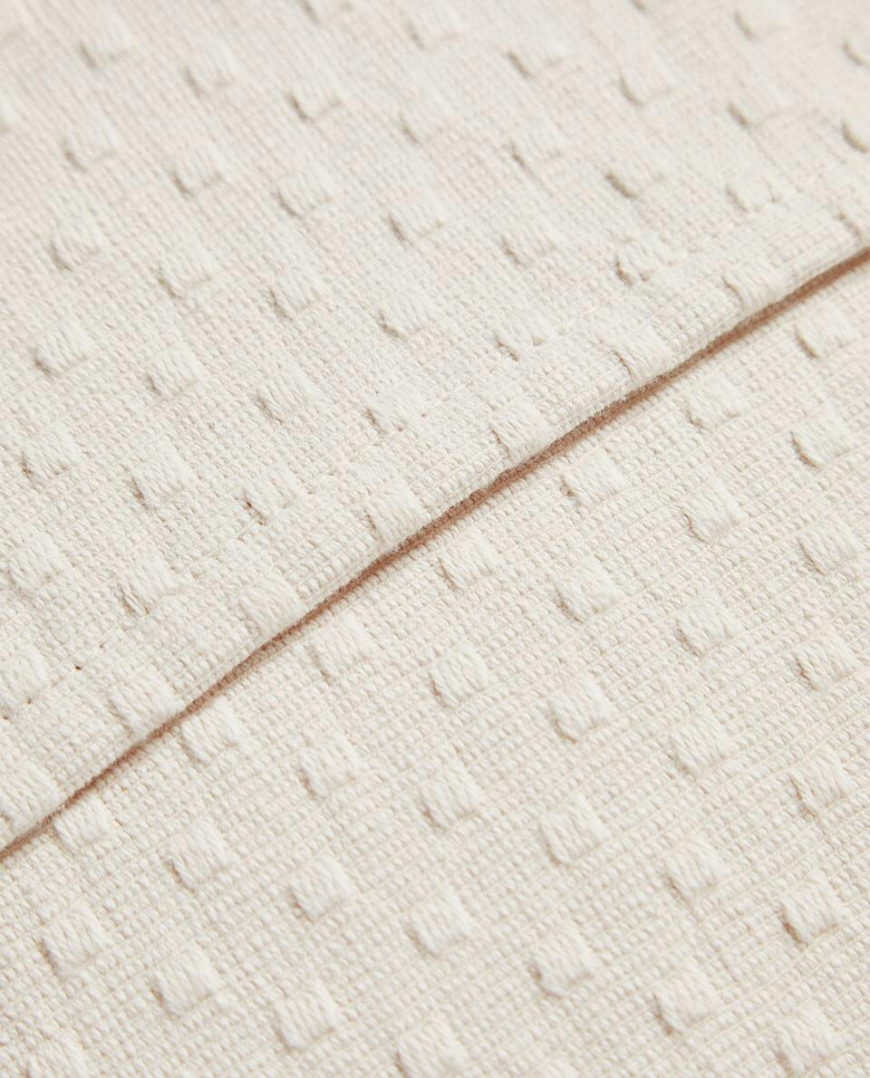 CUSHION COVER WITH POLKA DOT DESIGN