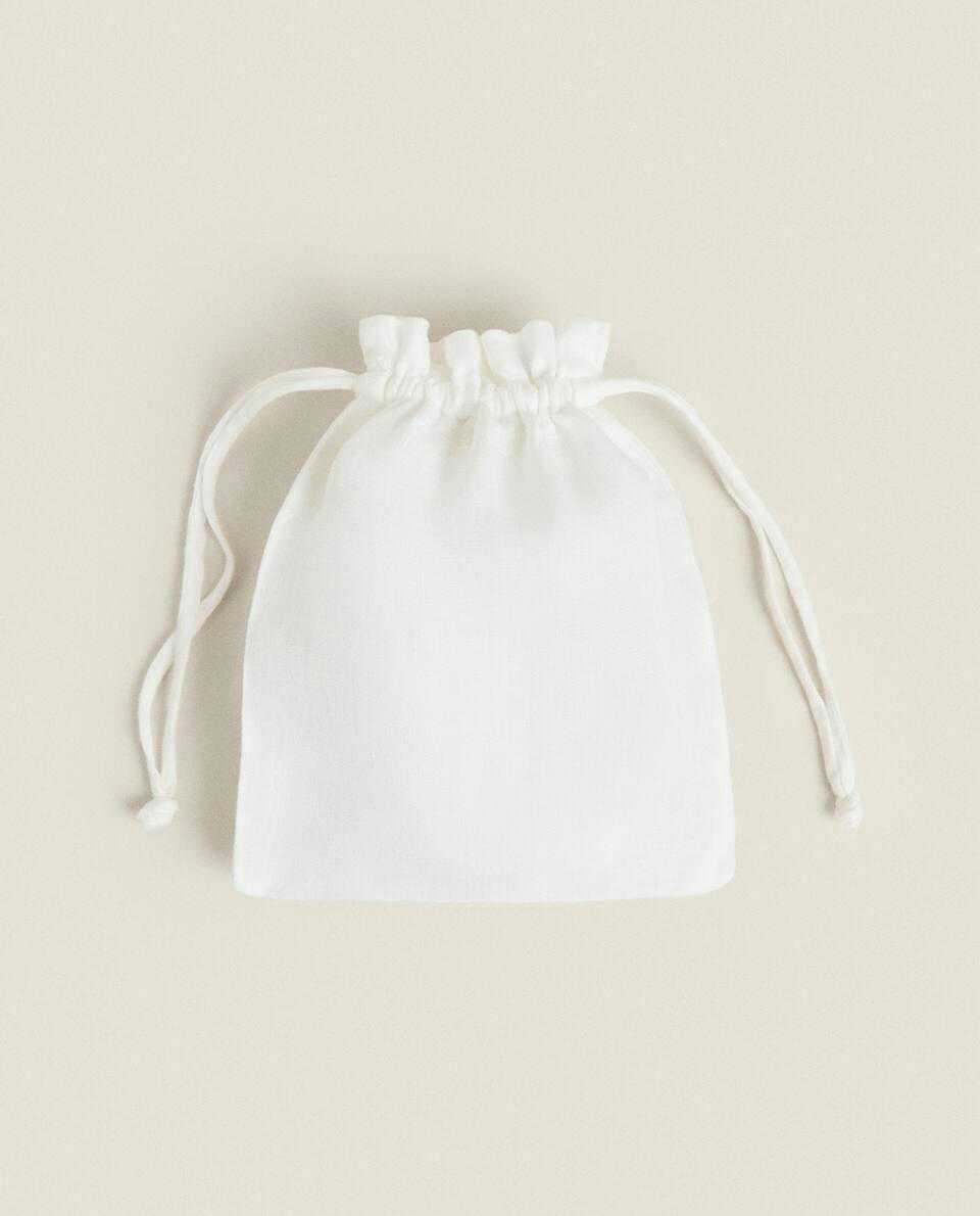 QUILTED LINEN SLIPPERS