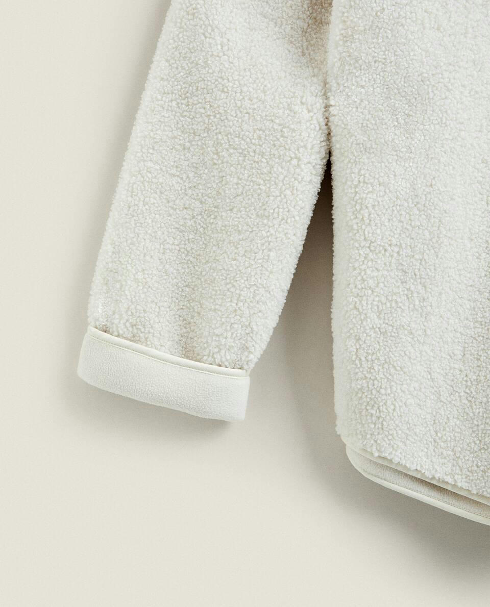 FAUX SHEARLING SWEATSHIRT