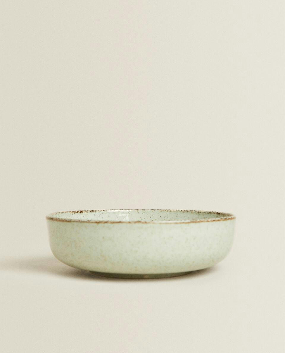 PORCELAIN BOWL WITH ANTIQUE FINISH RIM