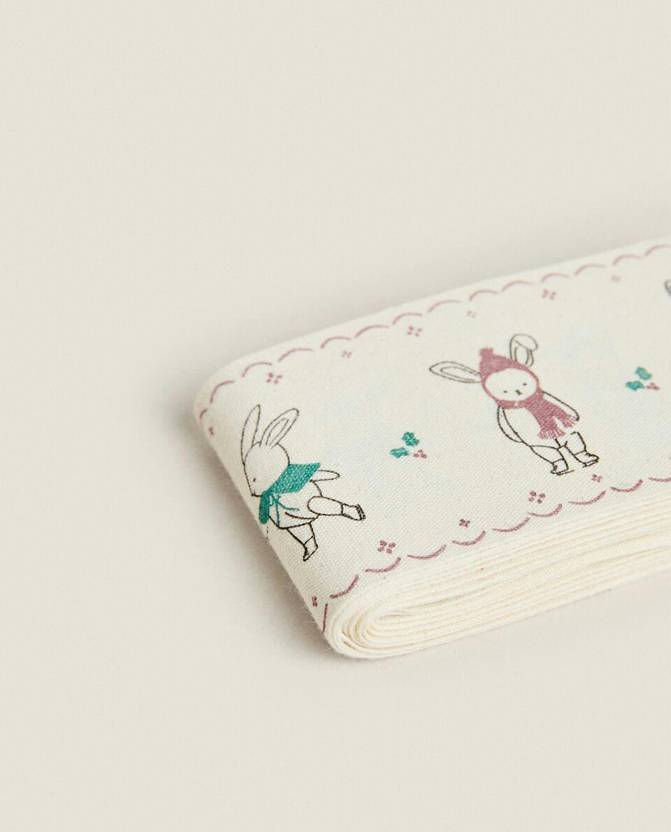 CHILDREN’S WRAPPING PAPER WITH CHRISTMAS BUNNY RABBITS