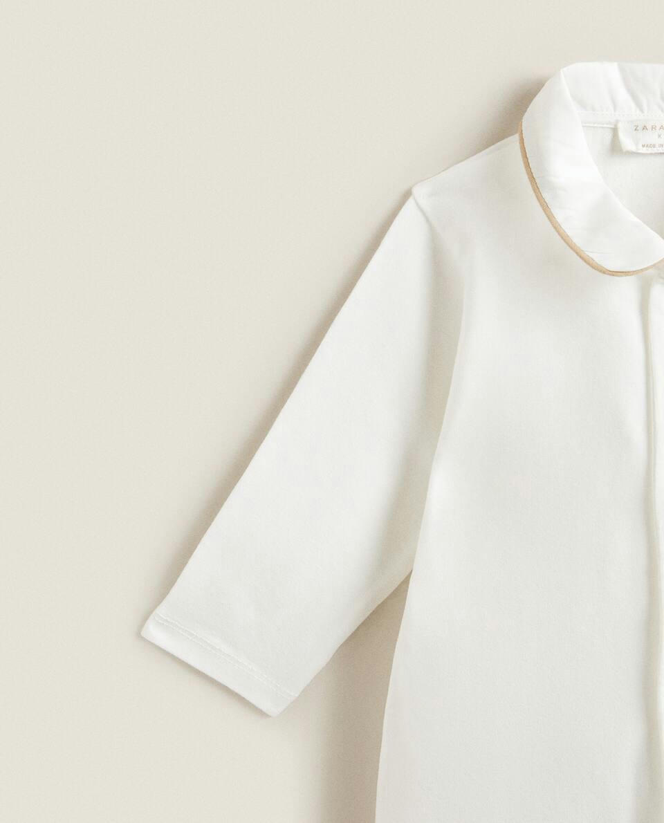 ROMPER WITH CONTRAST PIPING