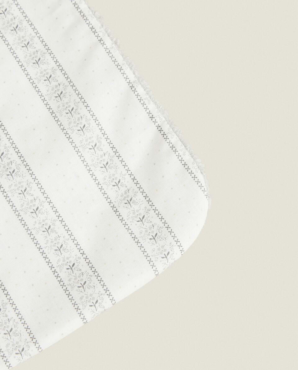 BIB WITH FLORAL BORDER