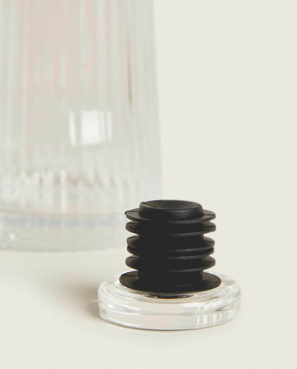 FACETED GLASS BOTTLE