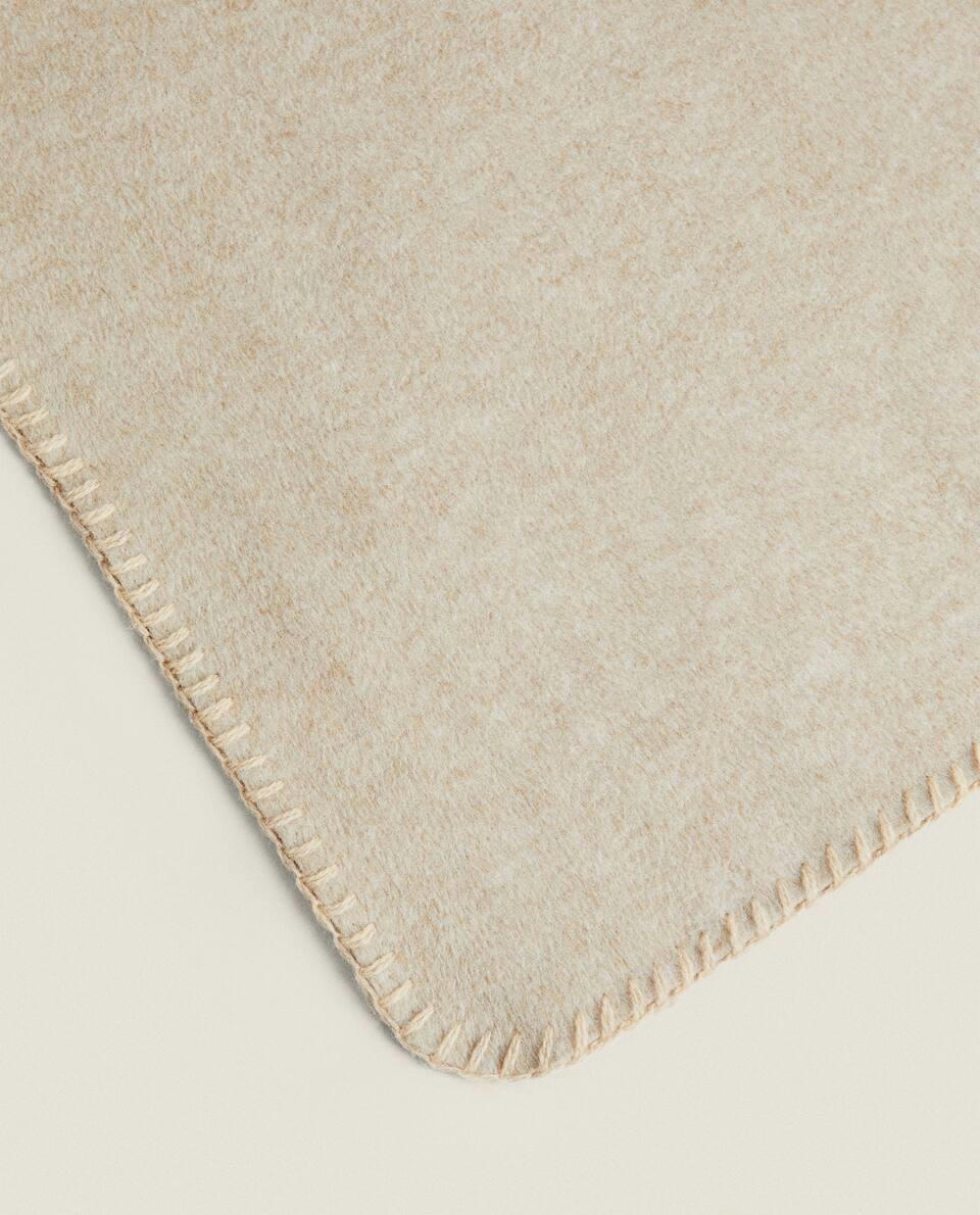 DOUBLE-FACED BLANKET