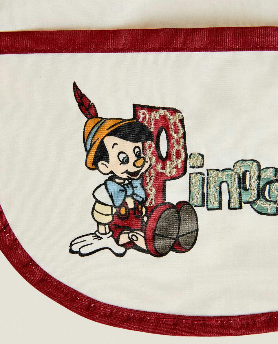 CHILDREN’S PINOCCHIO ? DISNEY RESIN-COATED CHRISTMAS BIB