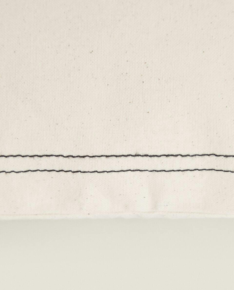 CUSHION COVER WITH BORDER