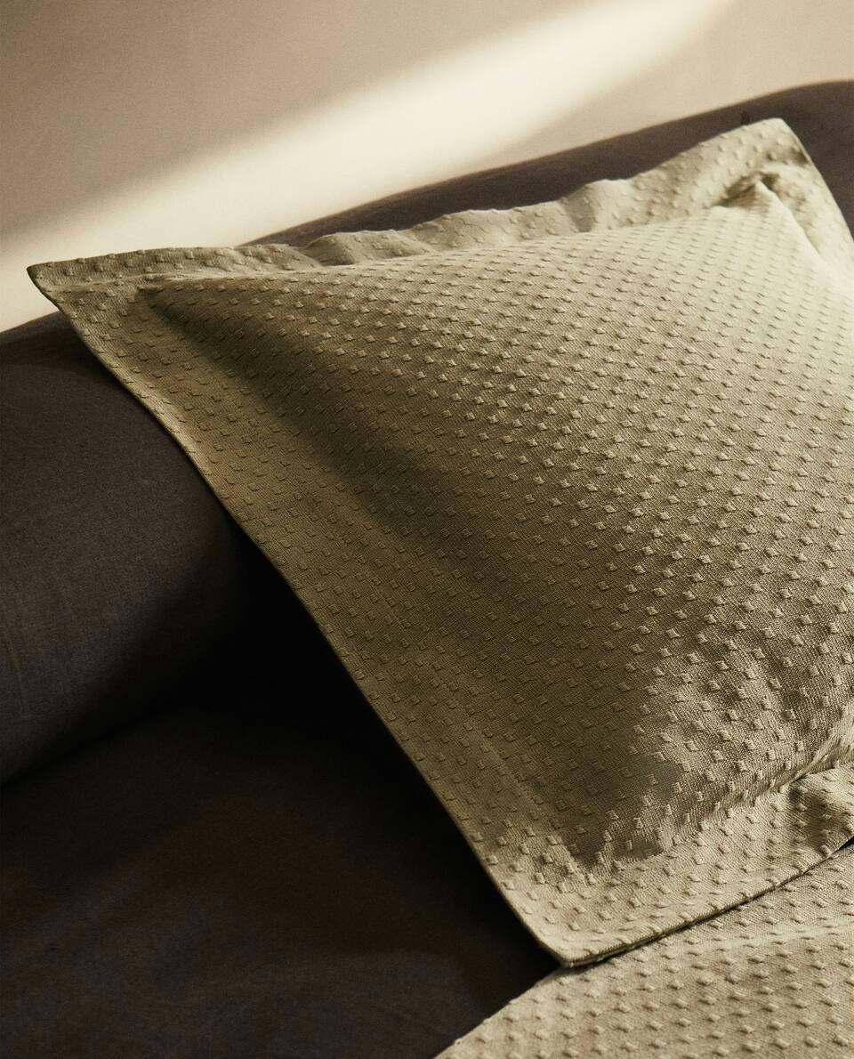 CUSHION COVER WITH POLKA DOT DESIGN