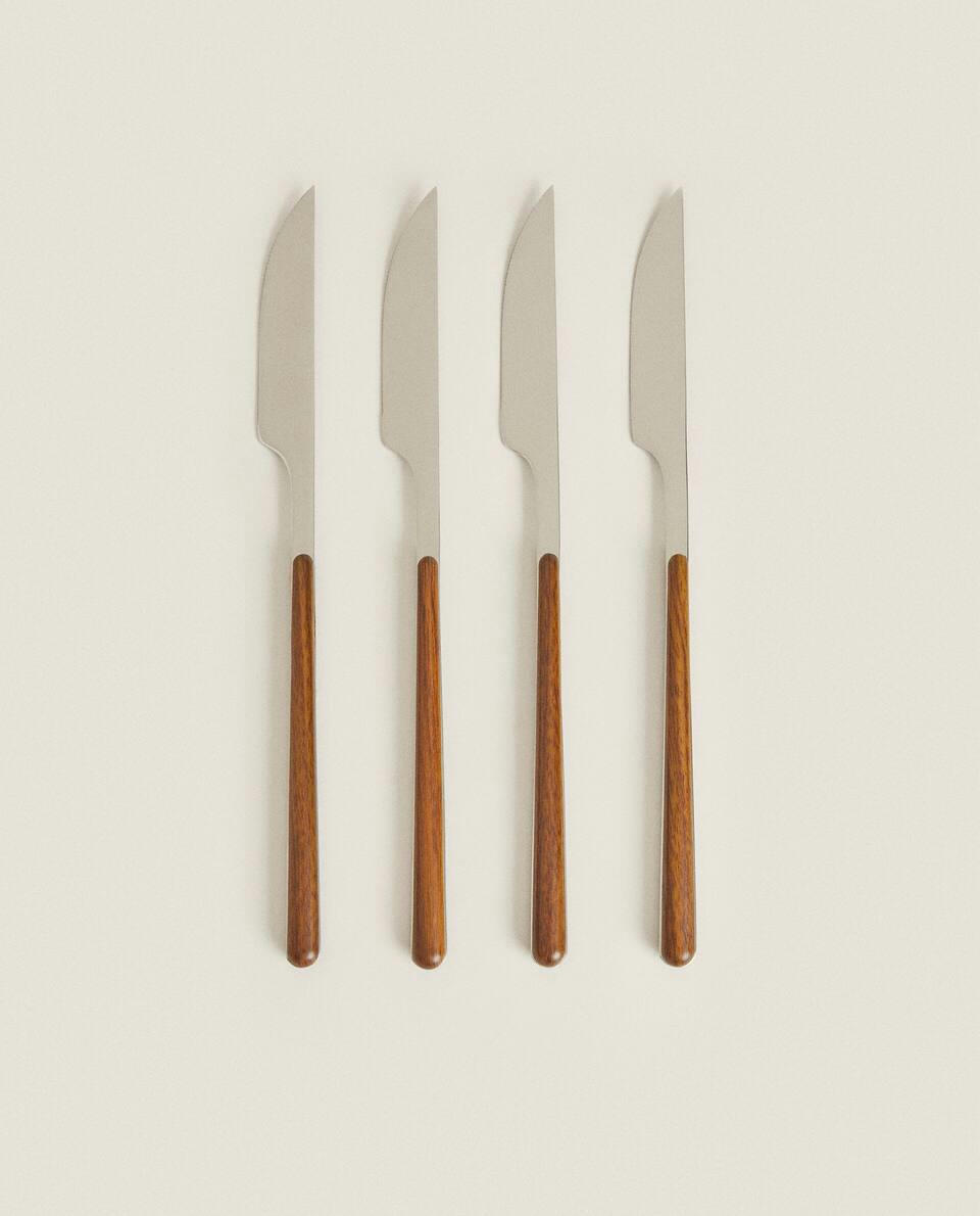 BOX 4 KNIVES WITH ROUND HANDLE DETAIL