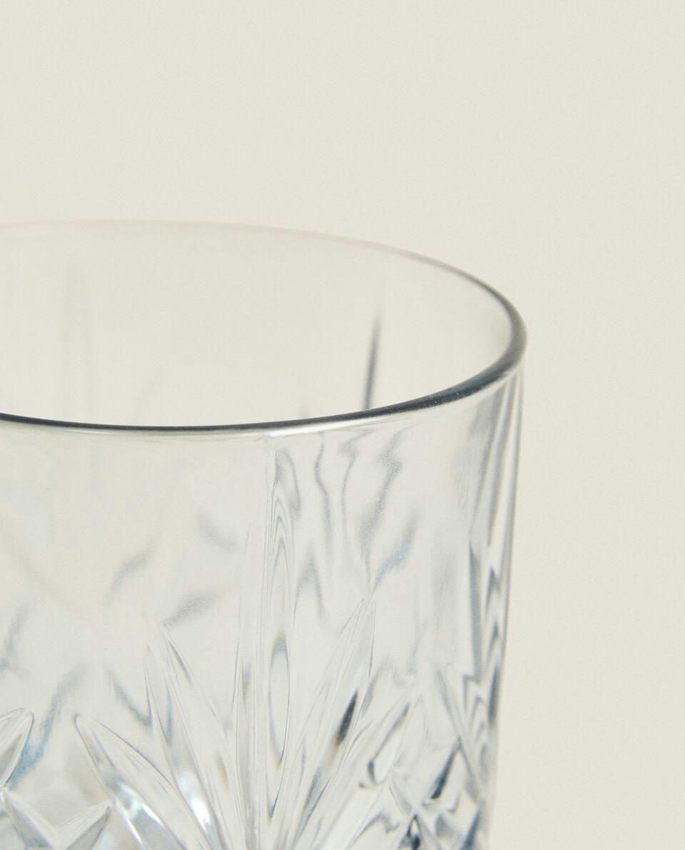 CRYSTALLINE TUMBLER WITH RAISED DESIGN