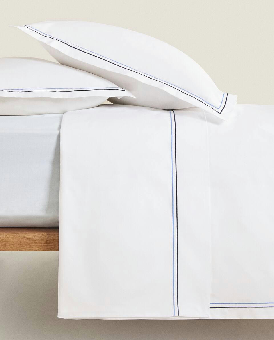 DUVET COVER WITH TWO EMBROIDERED DETAILS