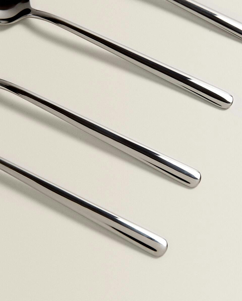 BOX OF 4 SHINY STEEL SPOONS