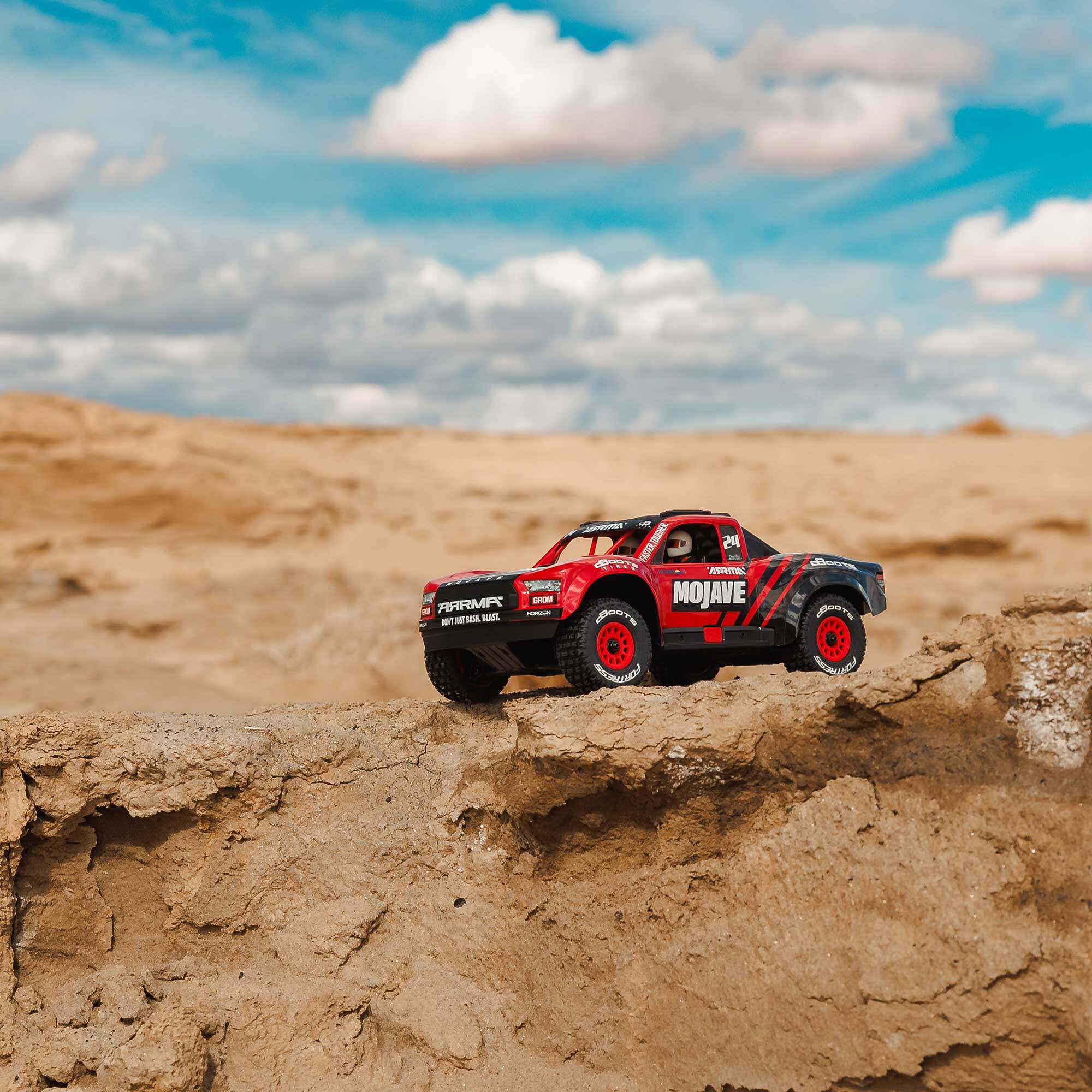 ARRMA 1/16 MOJAVE GROM 4X4 RTR Brushed Desert Truck (Battery & Charger Included), Red/Black