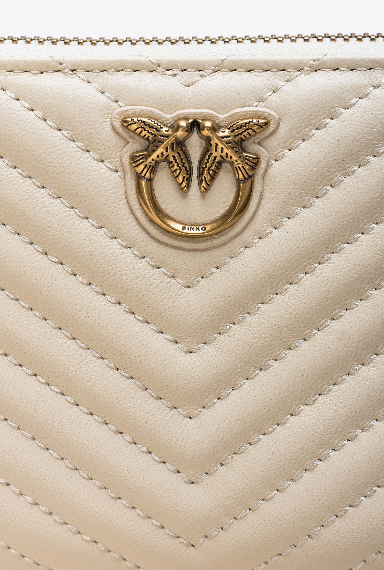 Small zip-around wallet in chevron-patterned nappa