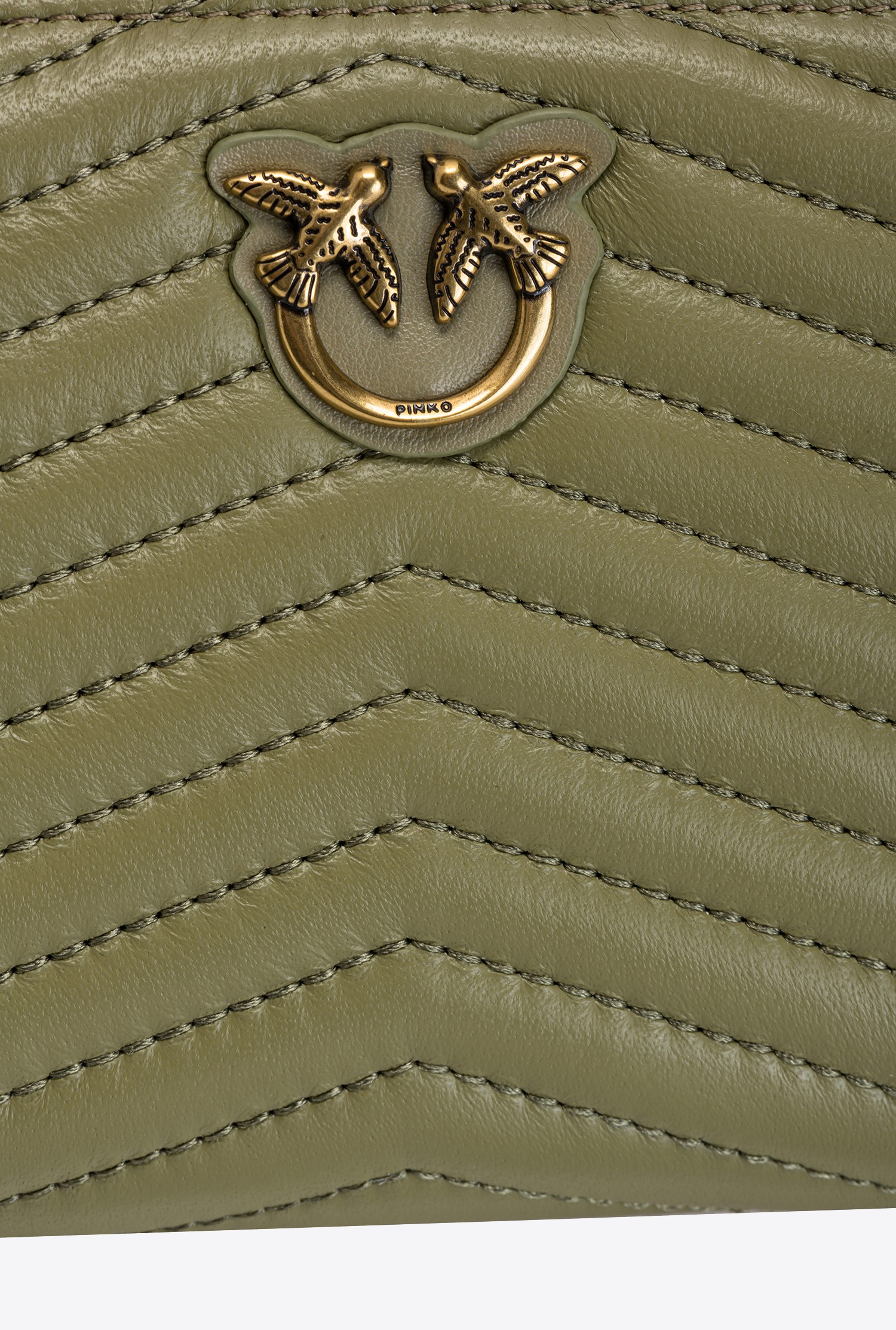 Zip-around purse in chevron-patterned nappa leather
