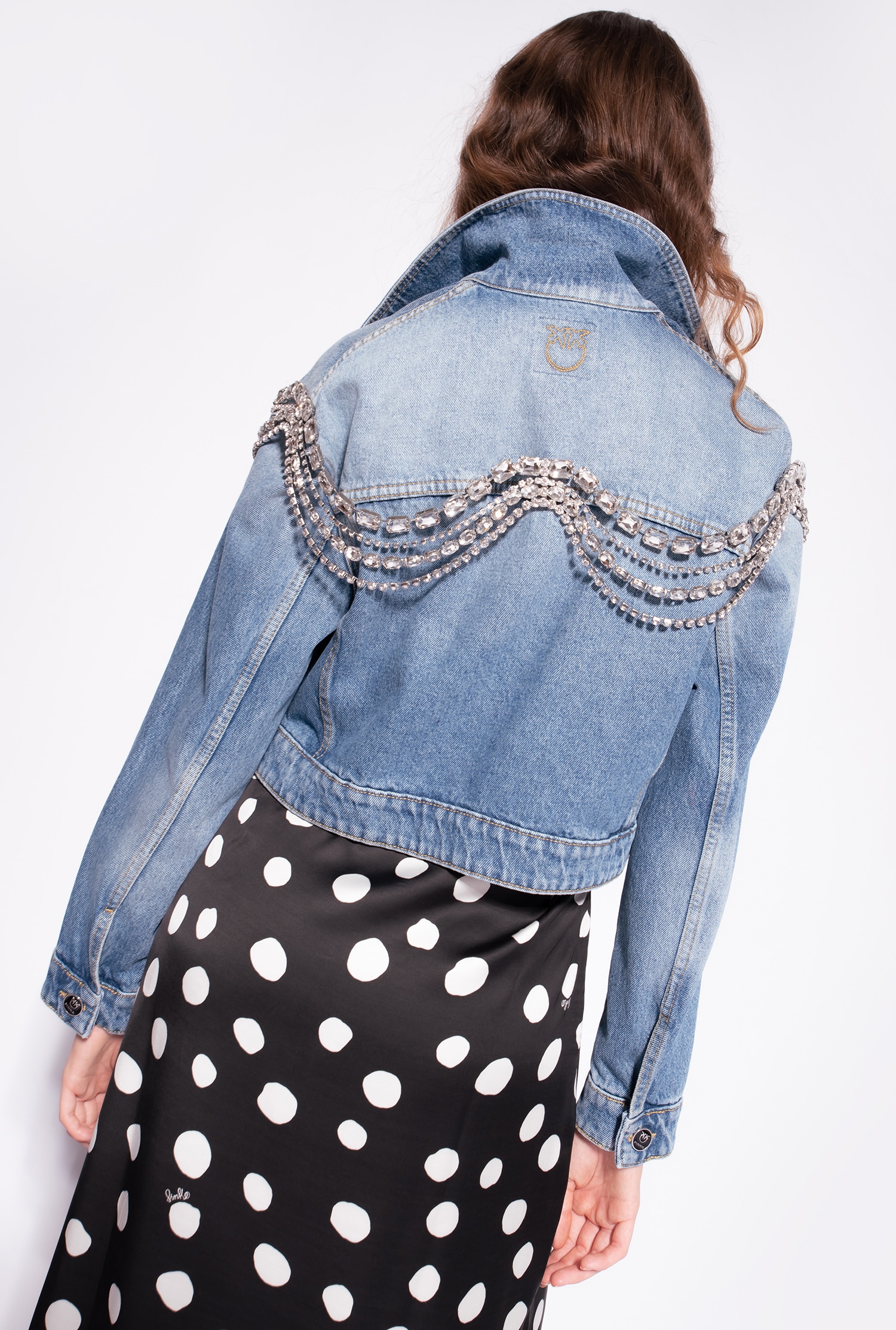 Denim jacket with jewel chains