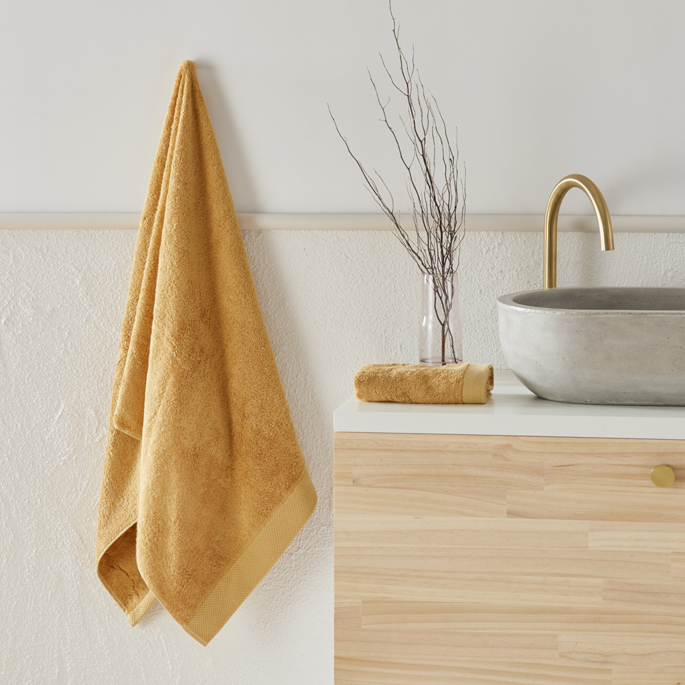 Navara Mustard Solid Bamboo Cotton Towel Range