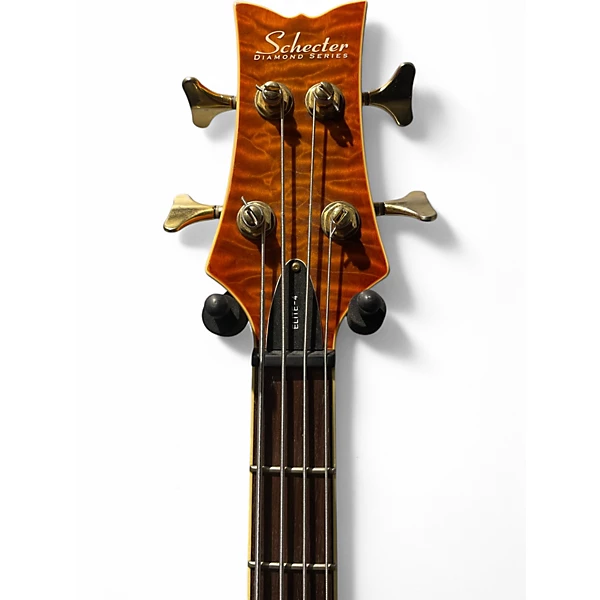 Schecter Guitar Research Used 2005 Schecter Guitar Research DIAMOND SERIES ELIT 4 Trans Amber Electric Bass Guitar.gc
