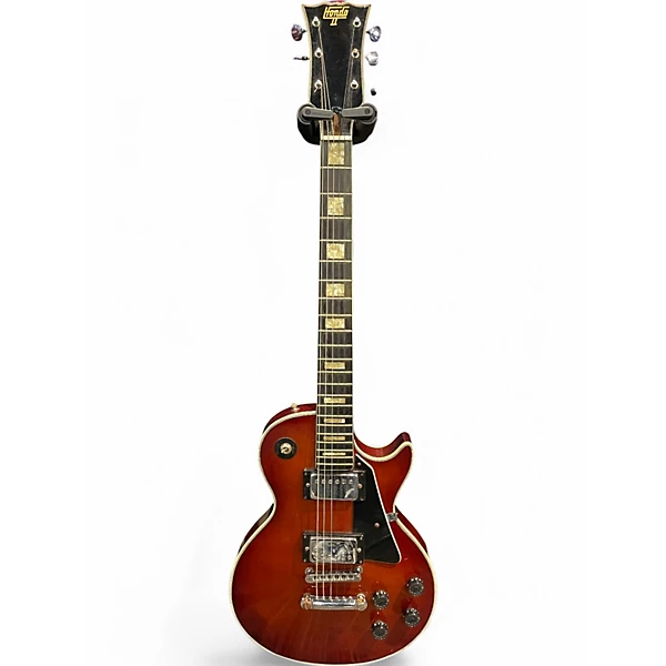 Vintage 1970s Hondo 1970's 2pu Electric Cherry Sunburst Solid Body Electric Guitar