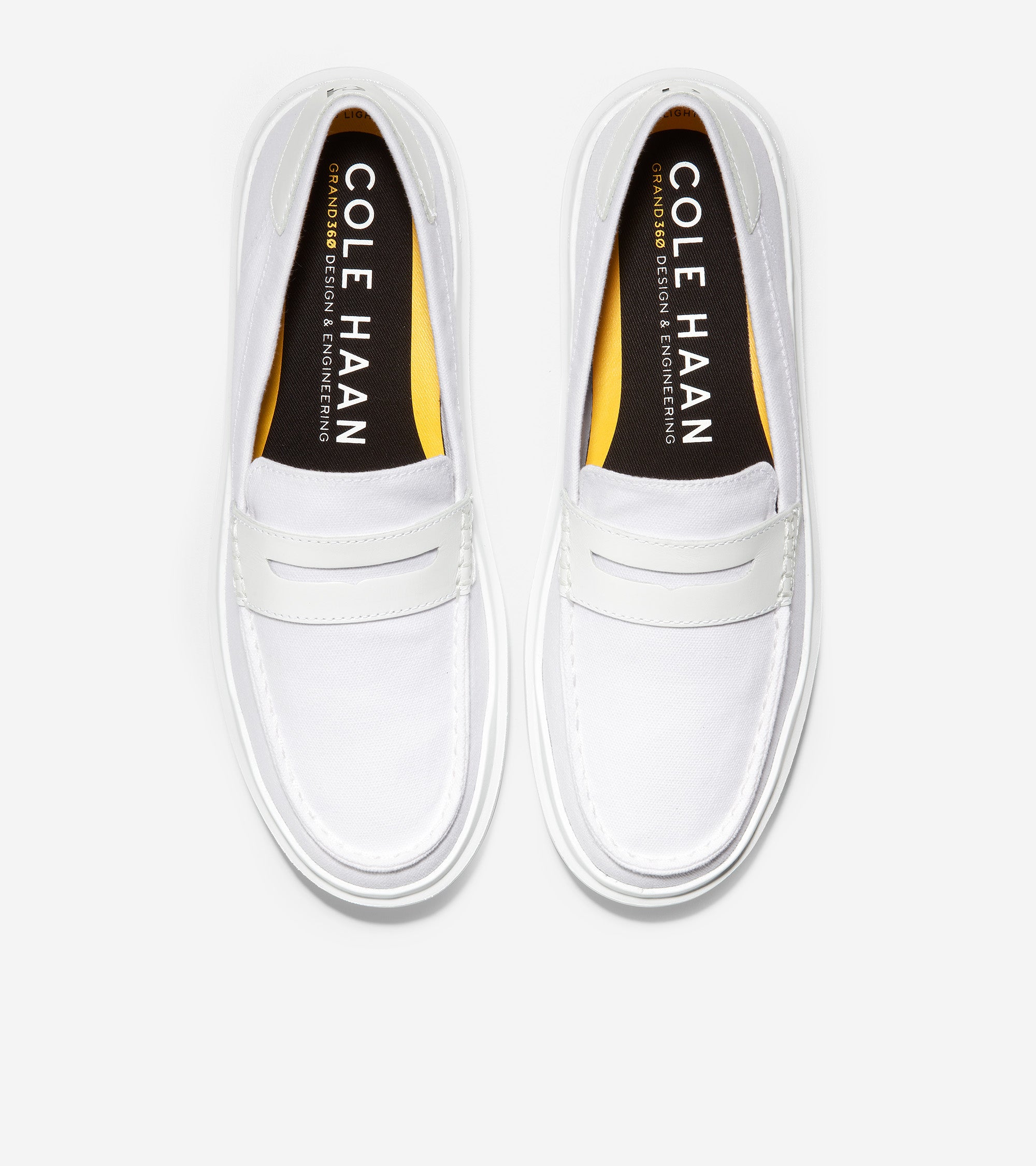 Women's GrandPrø Rally Canvas Penny Loafer