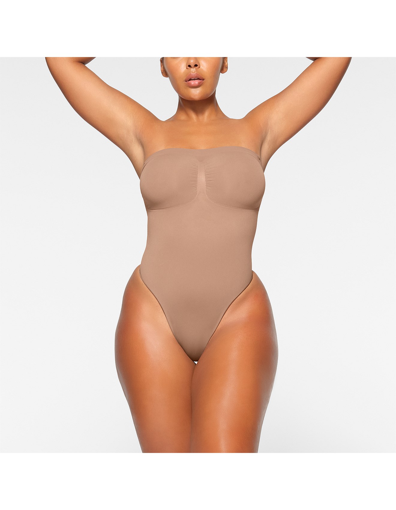SEAMLESS SCULPT STRAPLESS THONG BODYSUIT