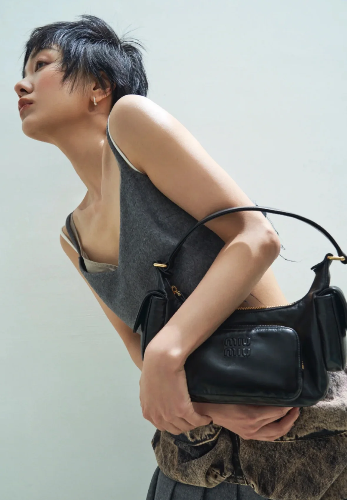 Сумка Miu Miu из кожи наппа с карманами — носите и делитесь с другими.