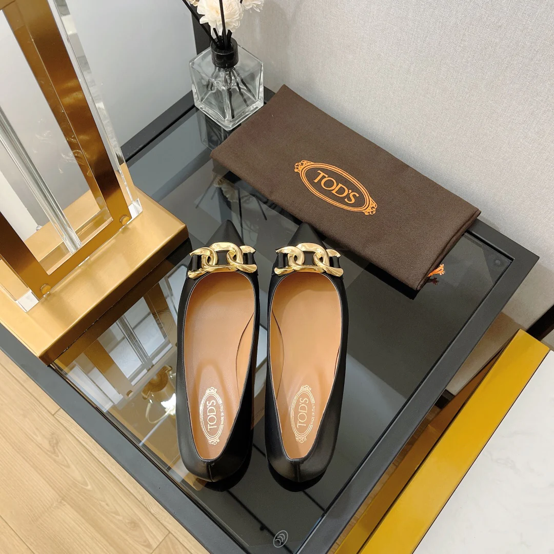 Туфли-балетки Tods с острым носком