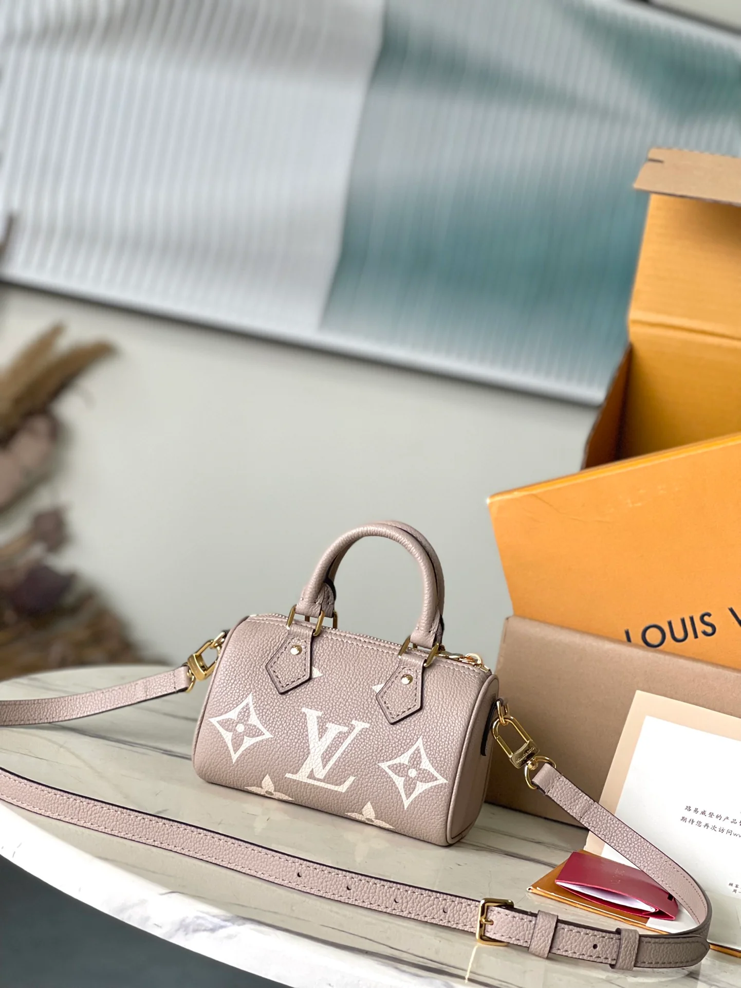 m82890-LV-nano-speedy-crossbody handbag-cream color