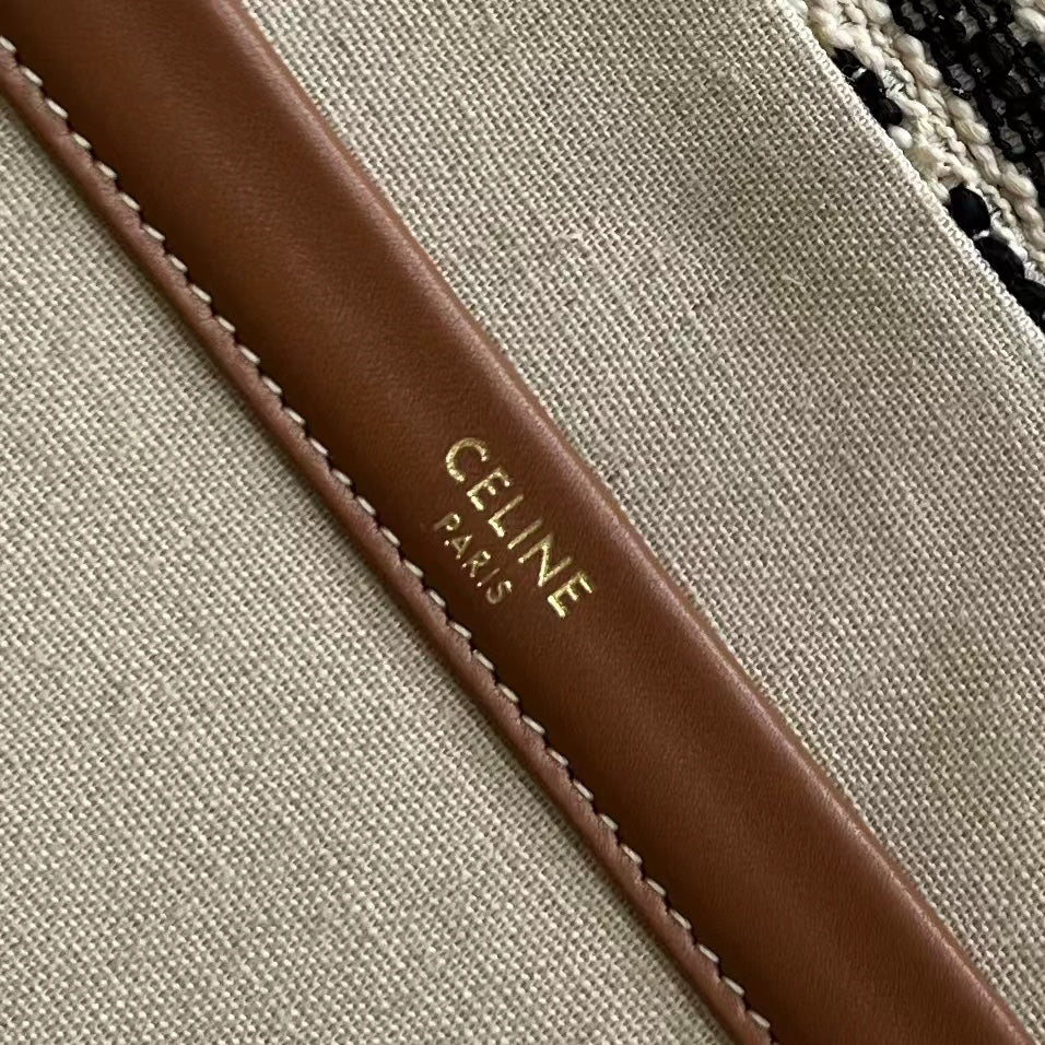 Сумка-шоппер Celine Cabas Thais с принтом - большая, белая и черная.